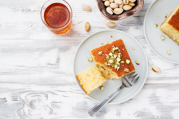 Revani - sweet semolina cake with pistachio, traditional turkish dessert