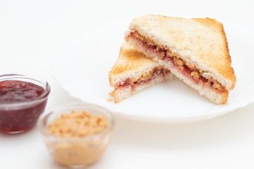 Sandwich with jam and peanut butter, delicious breakfast