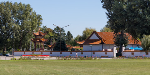 Fototapeta na wymiar Vienna, Austria - September 4, 2019: Chinese architecture in a small Austrian park by the Danube River
