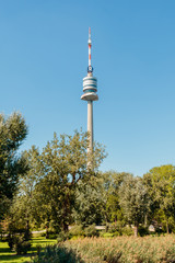 Obraz premium Vienna, Austria - September 4, 2019: The Danube Tower is a tower located in Donau Park in Vienna, the tallest structure in Austria at 252 metres