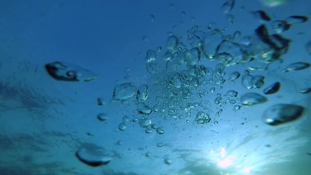 Slow motion underwater bubbles video