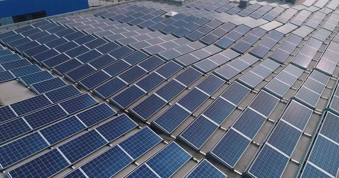 circular panorama of solar panels on factory roof, summer 2019