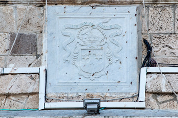 Marble plaque with the symbol on the wall of the Carmelite monastery Stella Maris in Haifa,