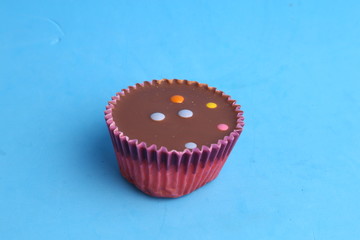 Chocolate cupcake with pink paper