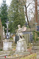 Lviv, Lviv region / Ukraine - February 01, 2020: photo taken on a walk along the Lychakiv cemetery in Lviv. Background for sculptures and monuments. Ancient cemeteries.