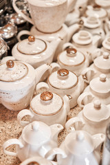 Group of empty cups and teapots in many rows. Tableware for coffee and tea in breakfast and seminar event.
