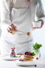 Woman making pancakes