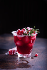 Red cocktail with ice
