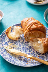 Breakfast with croissant and black coffee