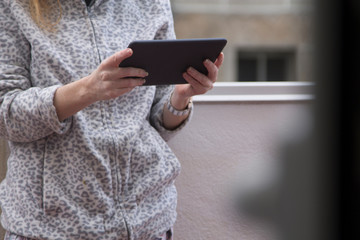 woman using a tablet or e-book