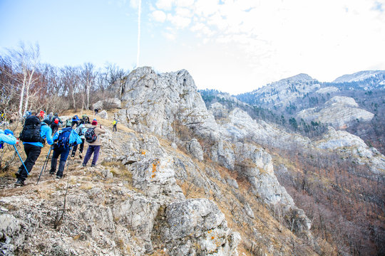  People trekking on the winter mountain landscape