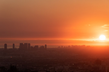 Sunset over Los Angeles city from Griffith Observatory in California, United States.