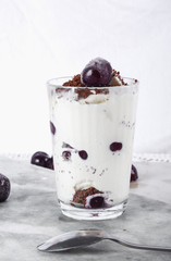 Ice cream with cherry berries on  marble countertop background