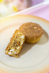 Closeup of keto muffins with cheese and pork cracklings;