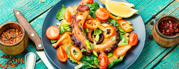 Salad with vegetables and octopus