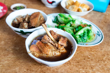 Serving of bak kut teh with vegetable, popular meal in Klang, Malaysia