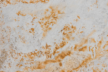 sandstone background with white and orange tones