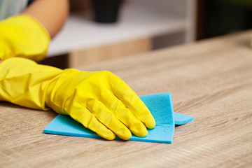 Close Up cleaning company worker hand holding sponge