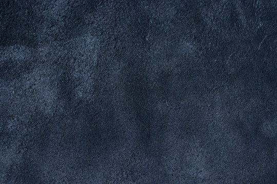 blue suede leather texture background closeup