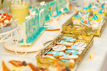 table setting with flowers and sweets
