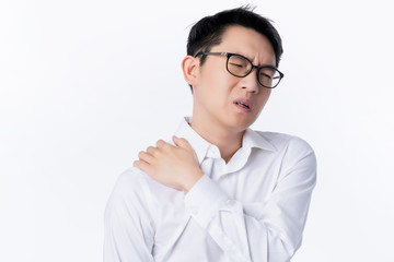 sick asian glasses male adult feel shoulder pain  hand touch shoulder muscle with stressful and tension white background office syndrome ideas concept