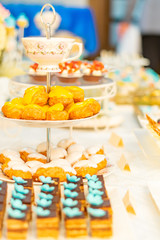 table setting with flowers and sweets