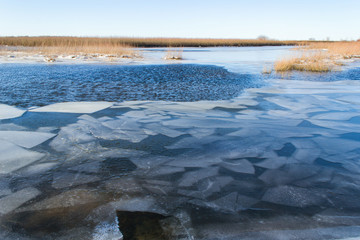 Melting ice. Spring ice drift on the river.