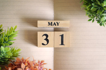 May 31, Appointment date with number cube design for background.