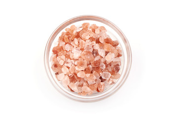 Fototapeta na wymiar Himalayan pink salt, isolated on white background
