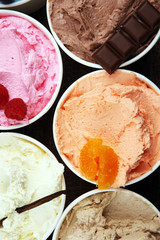 Various of ice cream flavor with fresh blueberry, strawberry, almond, chocolate, vanilla setup on rustic background . Summer and Sweet cold ice cream