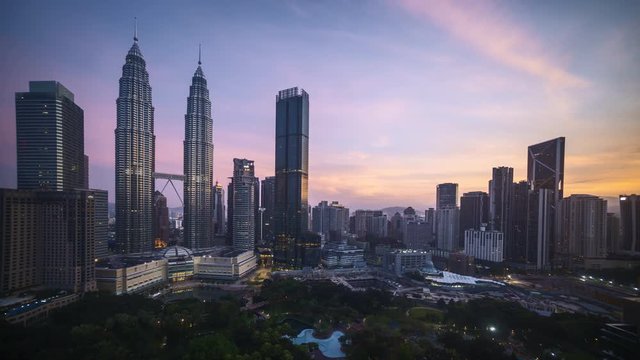 Kuala Lumpur, Malaysia - August 31, 2019: 4k time lapse of sunrise at Kuala Lumpur capital city centre