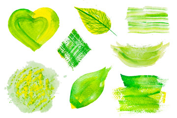 Set of fresh green hand drawn watercolor design elements,splases,stains,dabs,leaf,heart, isolated on the white background for your gesign
