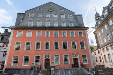 Wide angle view of big red house in Monschau, Eifel