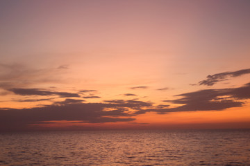 Beautiful pink color clouds on the sky.