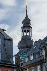 Fototapeta na wymiar View on the church spire with golden swan in Monschau, Eifel