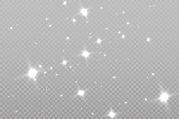 The dust sparks and golden stars shine with special light. Vector sparkles on a transparent background. Christmas light effect. Sparkling magical dust particles.