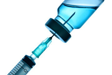 Vaccine bottle, syringe injection vial dose or vitamin for vaccination baby and child, medical background,medicine and drug concept