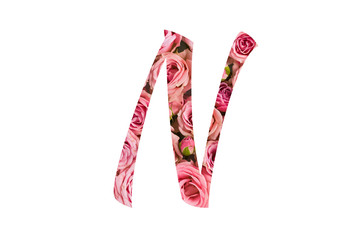 The letter N of the English alphabet is cut out of pink roses on a white isolated background.Floral pattern, texture.Bright alphabet for stores, sales, websites, postcards and holiday greetings.