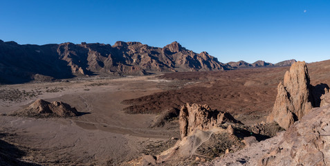 View to lava field and volcanic formation in Roques de Garcia area  in Teide National Park, Tenerife, Canary Islands, Spain. Panorama