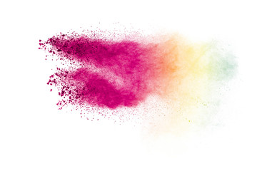 Colorful powder explosion on white background. Abstract pastel color dust particles splash.