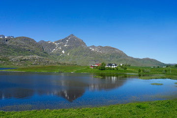 Naklejka na ściany i meble Lake near a fishing village Hovsund, Norway