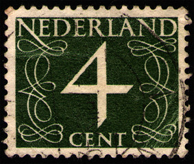 NETHERLANDS - CIRCA 1946: Postal stamp printed in the Netherlands (Holland), shows value of 4 cent,...