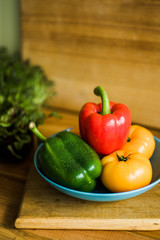 Colorful of Fresh Sweet Peppers on a Wooden Dish, Raw Organic Vegetable on a Table Ready to Cooking in The Kitchen Room.
