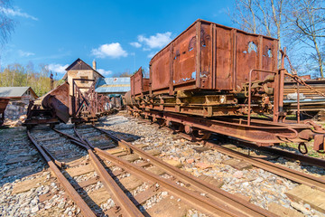 Fototapeta na wymiar Old broken rusted train in decay, Solvayovy lomy open air museum, Svaty Jan pod Skalou, Czech republic