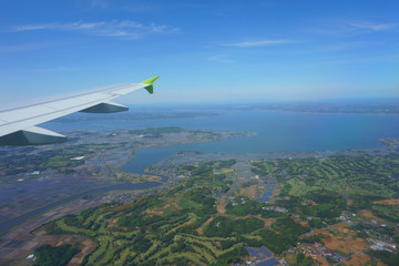 Approach Tokyo Narita airport. Air travel. VIew from an airplane window