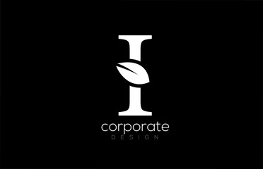 black and white I letter alphabet leaf logo icon design for company and business