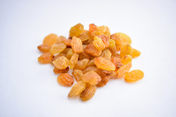 golden Yellow raisins isolated on white background Close-Up Macro Stock Photography Image