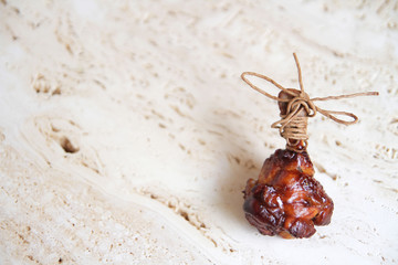 fried chicken wings on a marble surface, with spices and herbs.