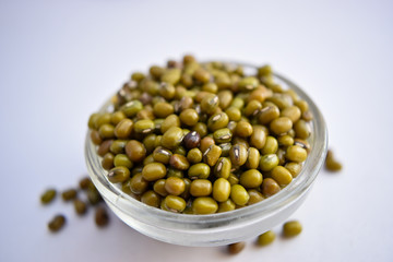 Mung Beans in A Glass Bowl on White Background Close-Up Stock Photograph Image