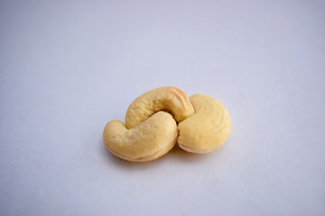 cashew nuts heap on white background Full depth of field Close-Up Stock Photography Image